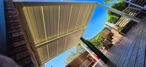 Motorised louvered pergola providing outdoor shade in Parramatta, NSW