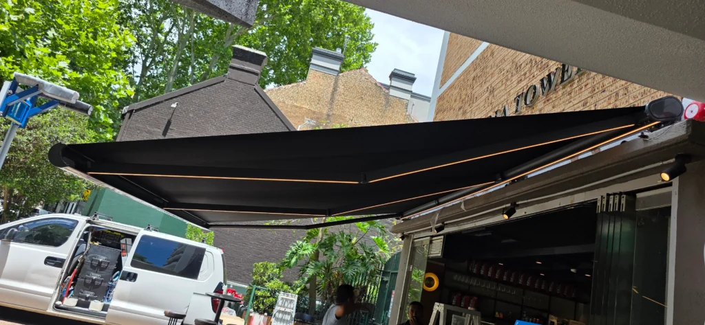 Motorised outdoor awning project in Darling Harbour, NSW